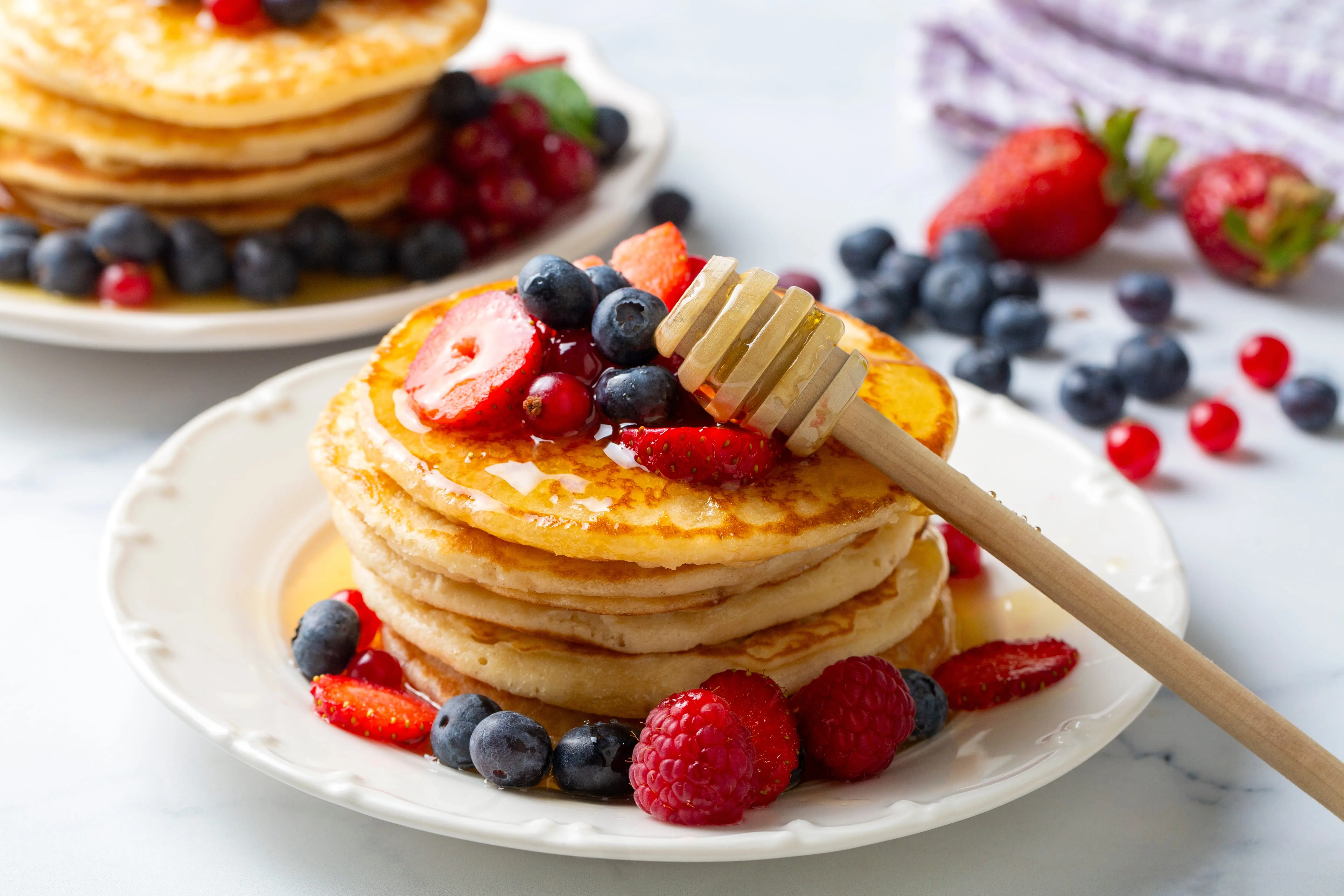 American pancakes with fresh fruit and honey