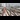 Rail Industrial Relations: A group of railway workers work along an elevated railway line.