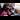 Avanti Trains: A father and daughter watch a video on his phone as they travel through the countryside on a train.