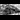 Steam Train: A black and white photo of a steam engine locomotive