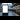 Trains in the UK: A blank digital billboard at a train station with many passengers walking by in the distance.