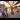 Passengers walk along a train platform