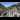 Travelling by Train: A red Bernina Express train in the mountains