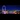 A wide-angle view of the neon-lit London Eye standing across from Westminster in the late evening.