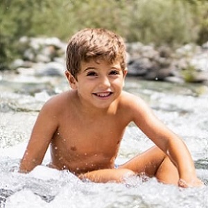 Kid in the river