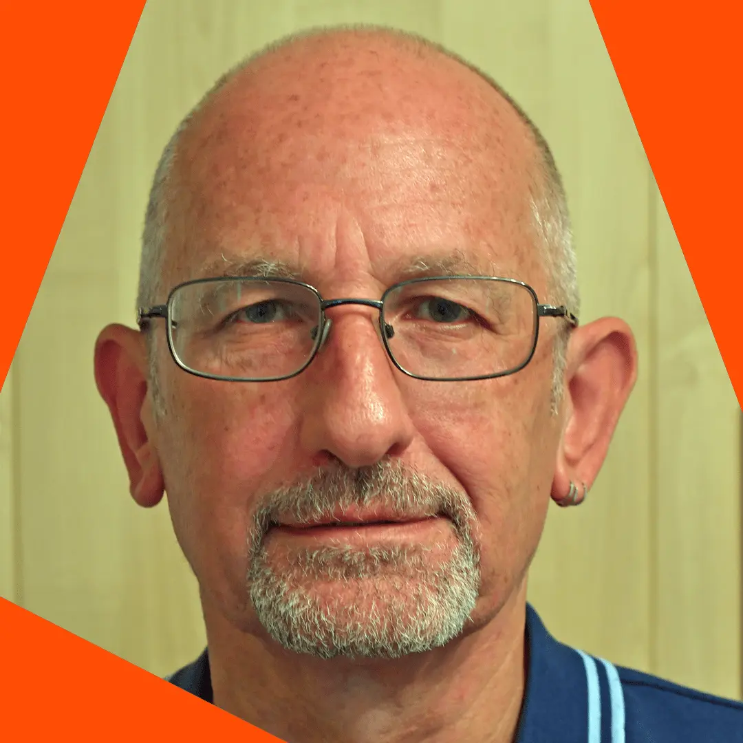 Paul Bigley headshot with spark border