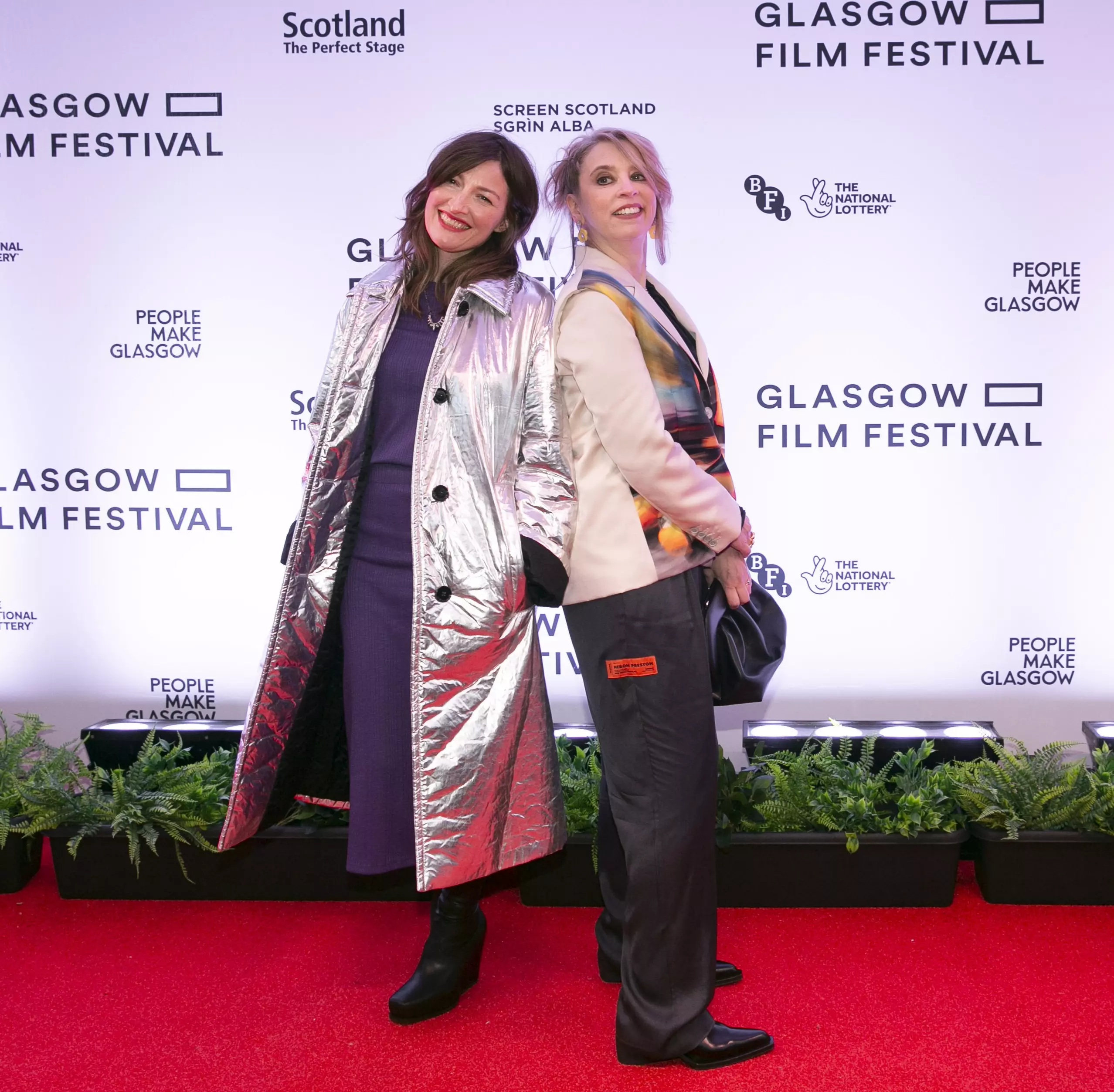 Glasgow festival presenters on red carpet