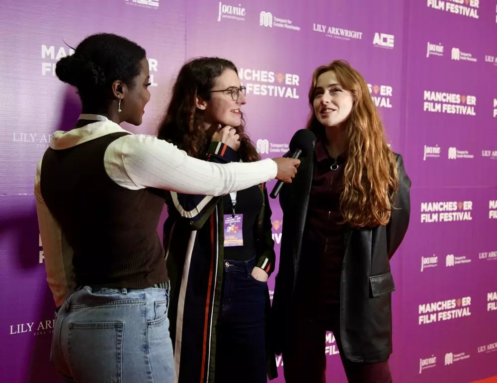 Woman getting interviewed at Manchester Film Festival