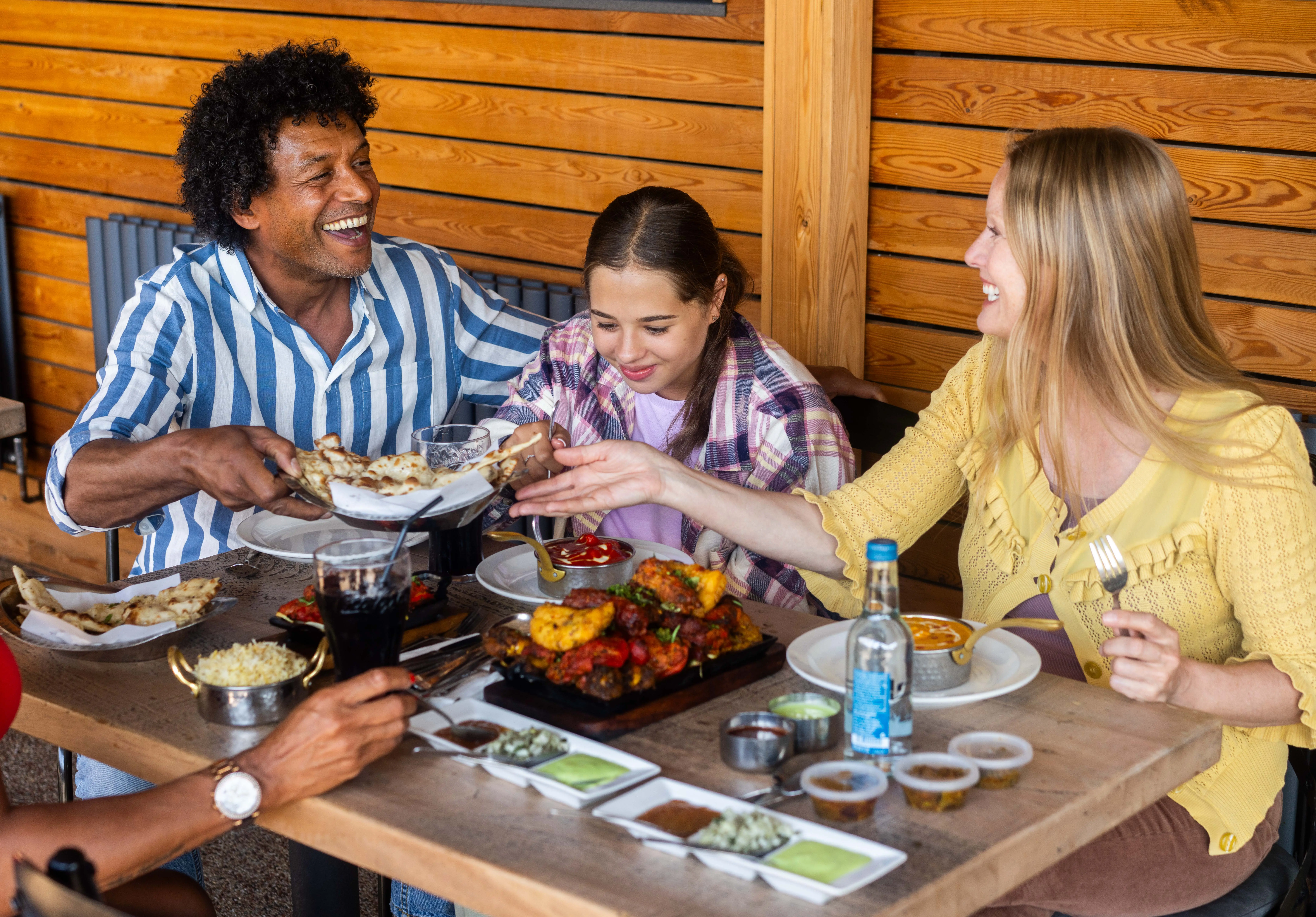 A family enjoying a meal at The Red Lion