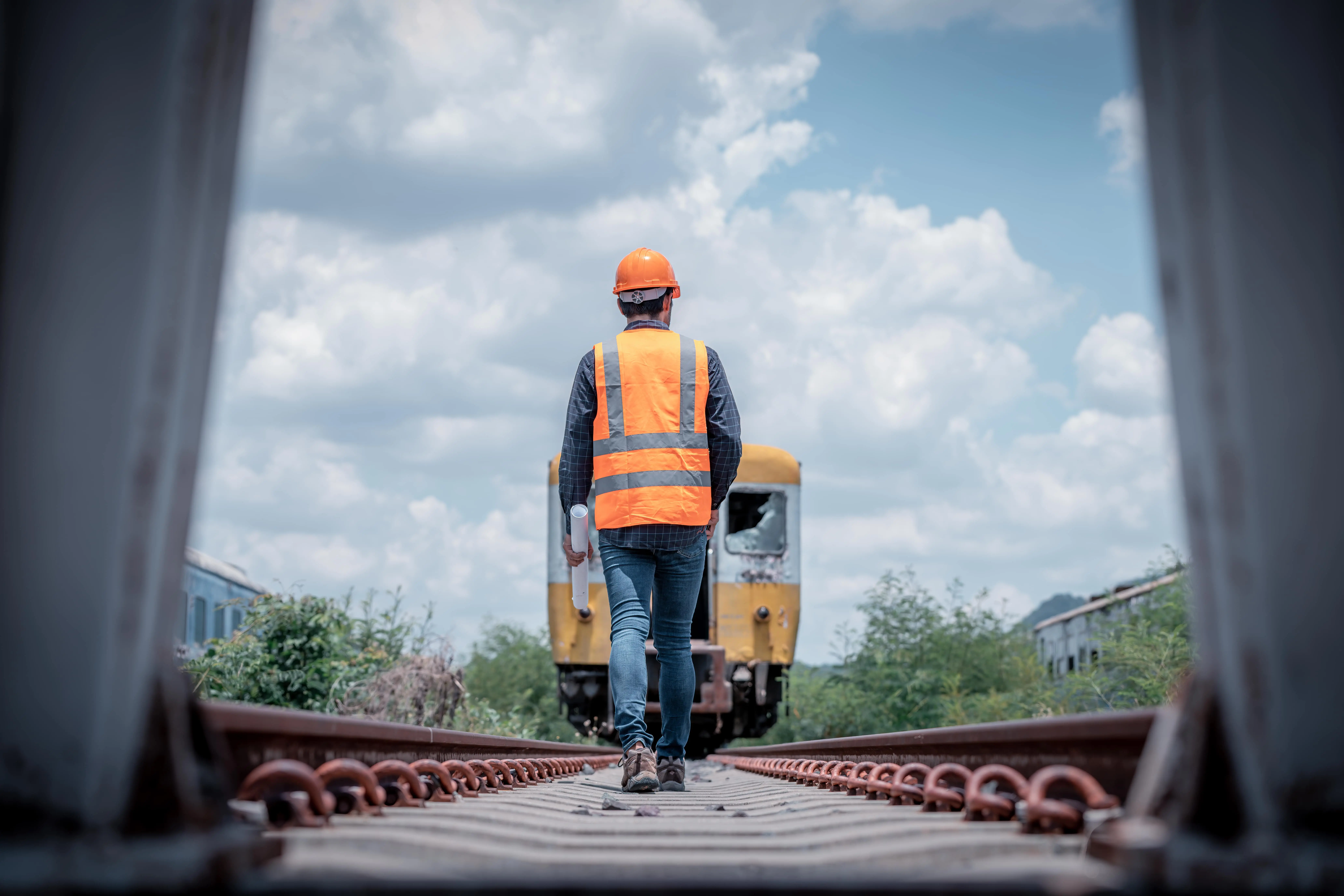A railway engineer reviewing ongoing development of new railway lines.